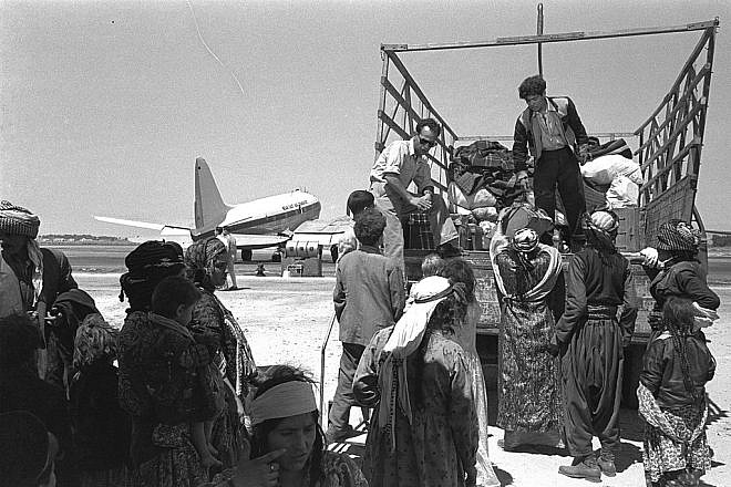 Jewish refugees from Iraq leave Lod (today Ben-Gurion) Airport, 1951. Credit: GPO via Wikimedia Commons.