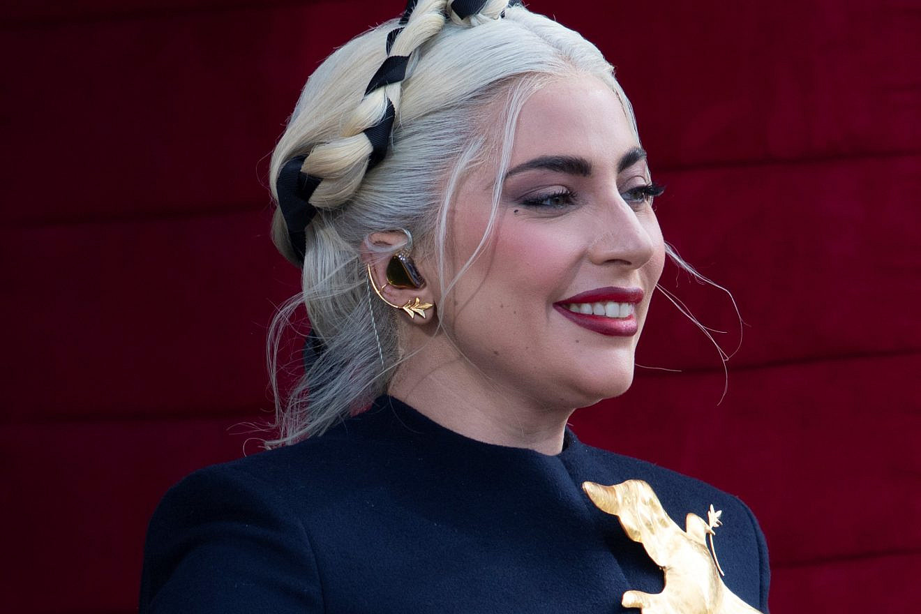 Lady Gaga enters the inauguration platform as she prepares to sing a rendition of “The Star-Spangled Banner” at the 59th Presidential Inauguration ceremony in Washington, D.C., on Jan. 20, 2021. Credit: Department of Defense Photo by Navy Petty Officer 1st Class Carlos M. Vazquez II.