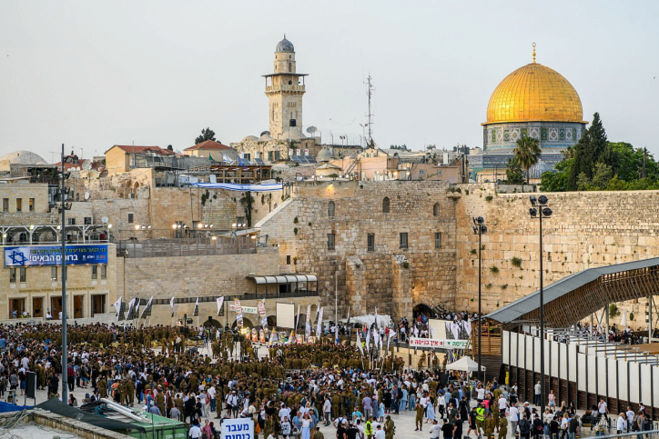 Israeli soldiers from Netzah Yehuda Battalion and family members attend a swearing-in ceremony at the Western Wall in Jerusalem's Old City, on May 17, 2023. Photo by Arie Leib Abrams/Flash90