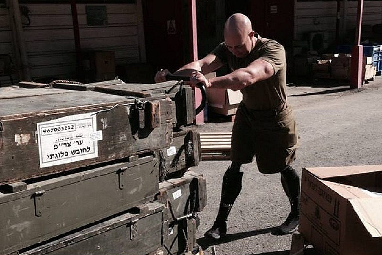 Rep. Brian Mast (R-Fla.) volunteering on a military base near Tel Aviv in January 2015. Credit: Courtesy.