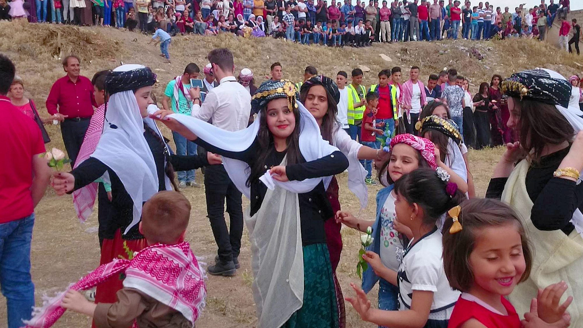 A Yazidi ceremony called Tawwaf in the town of Baashiqa in Iraq, Aug. 16, 2016. Credit: Ammar Doghat via Wikimedia Commons,