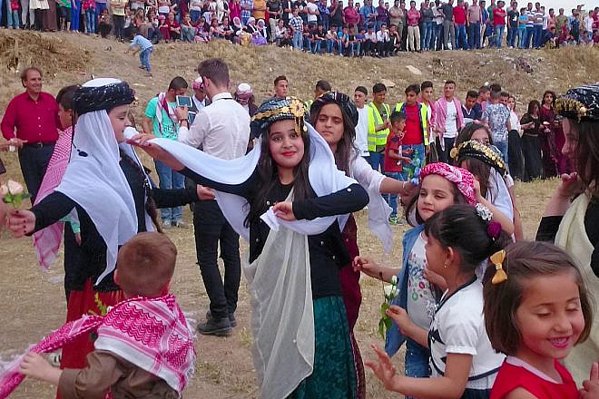 A Yazidi ceremony called Tawwaf in the town of Baashiqa in Iraq, Aug. 16, 2016. Credit: Ammar Doghat via Wikimedia Commons,
