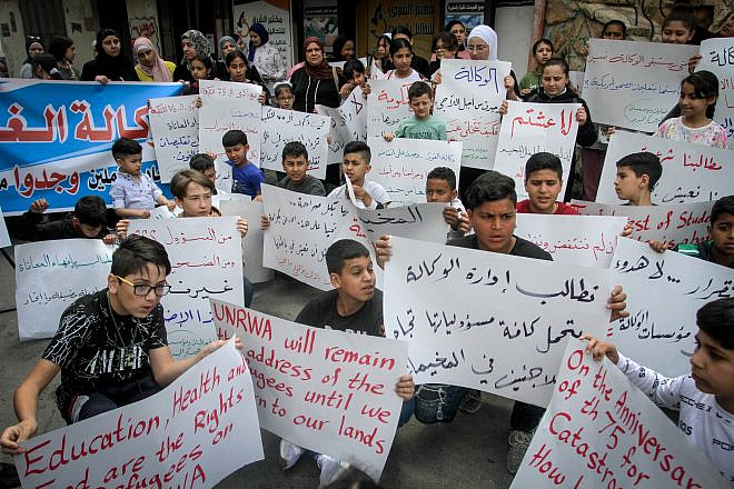 Palestinians outside the headquarters of the U.N. Relief and Works Agency (UNRWA) in the Askar refugee camp, east of Nablus, on May 8, 2023. Photo by Nasser Ishtayeh/Flash90.