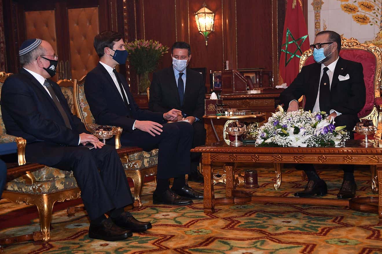 KIng Mohammed VI (right) hosts then-U.S. presidential adviser Jared Kushner (second from left) and then-Israeli National Security Adviser Meir Ben-Shabbat (left) in Rabat, Dec. 22, 2020. Credit: David Azagury/U.S. Embassy Jerusalem via Wikimedia Commons.