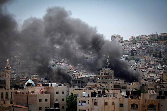 Smoke rises as Israel conducts an aerial and ground offensive in Jenin, Samaria, on July 3, 2023. Photo by Nasser Ishtayeh/Flash90.
