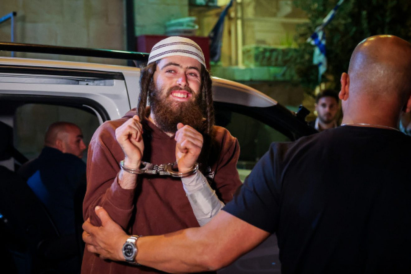 Homicide suspect Elisha Yered arrives for a hearing at the Jerusalem Magistrate's Court, Aug. 5, 2023. Photo by Chaim Goldberg/Flash90.