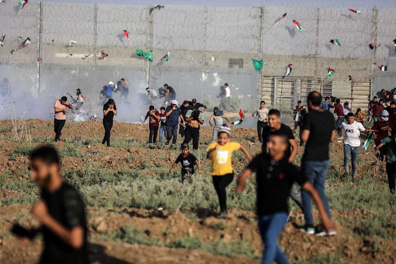Gazans riot at the border fence with Israel, Aug. 21, 2023. Credit: Majdi Fatchi/TPS.