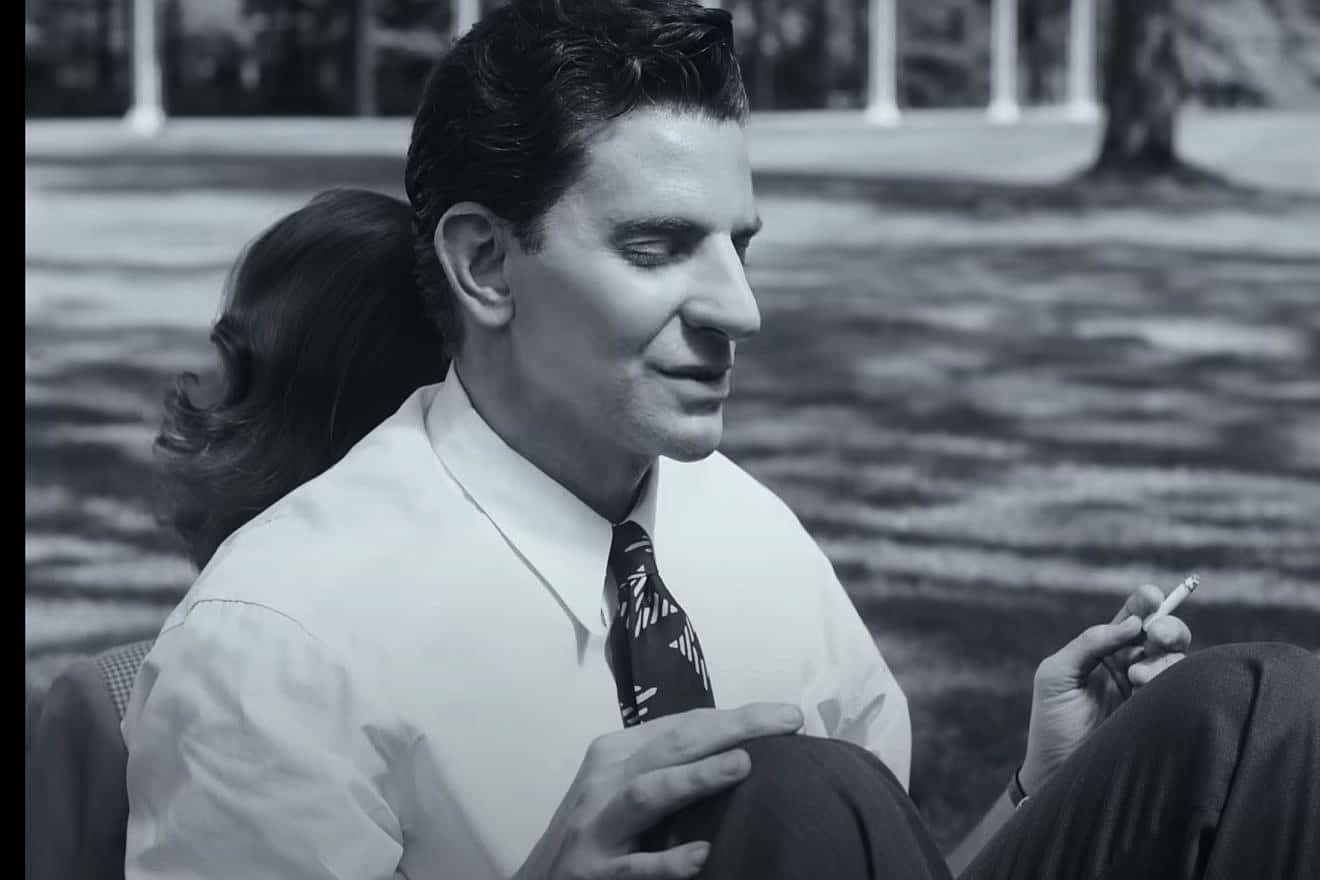Actor Bradley Cooper plays musician Leonard Bernstein in the film "Maestro," which he directed. Source: YouTube screenshot of the film trailer.