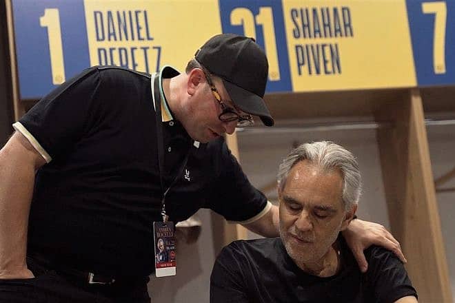 Israel Schachter with opera singer Andrea Bocelli in Tel Aviv. Credit: Courtesy.