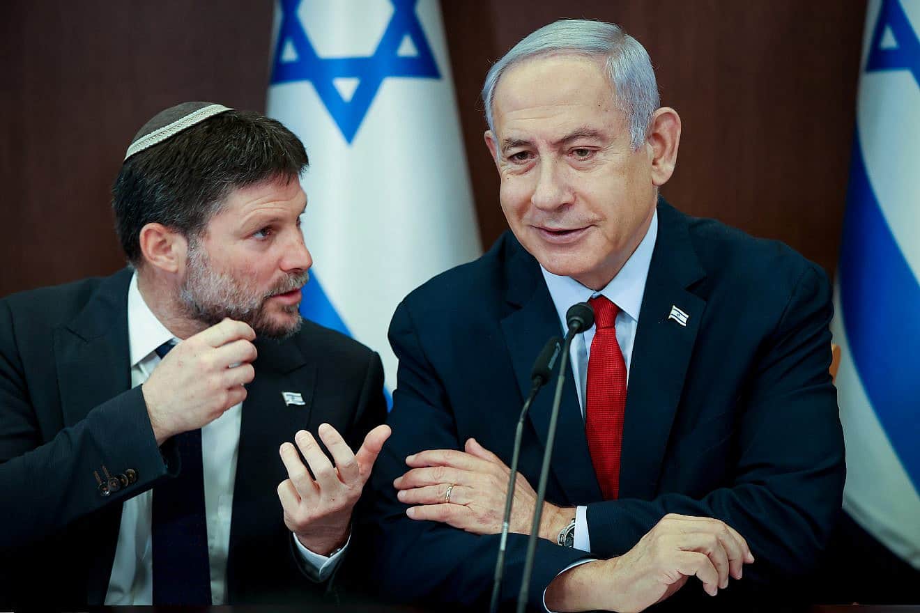 Israeli Prime Minister Benjamin Netanyahu speaks with Israeli Finance Minister Bezalel Smotrich during a Cabinet meeting in Jerusalem, on June 18, 2023. Photo by Amit Shabi/POOL.