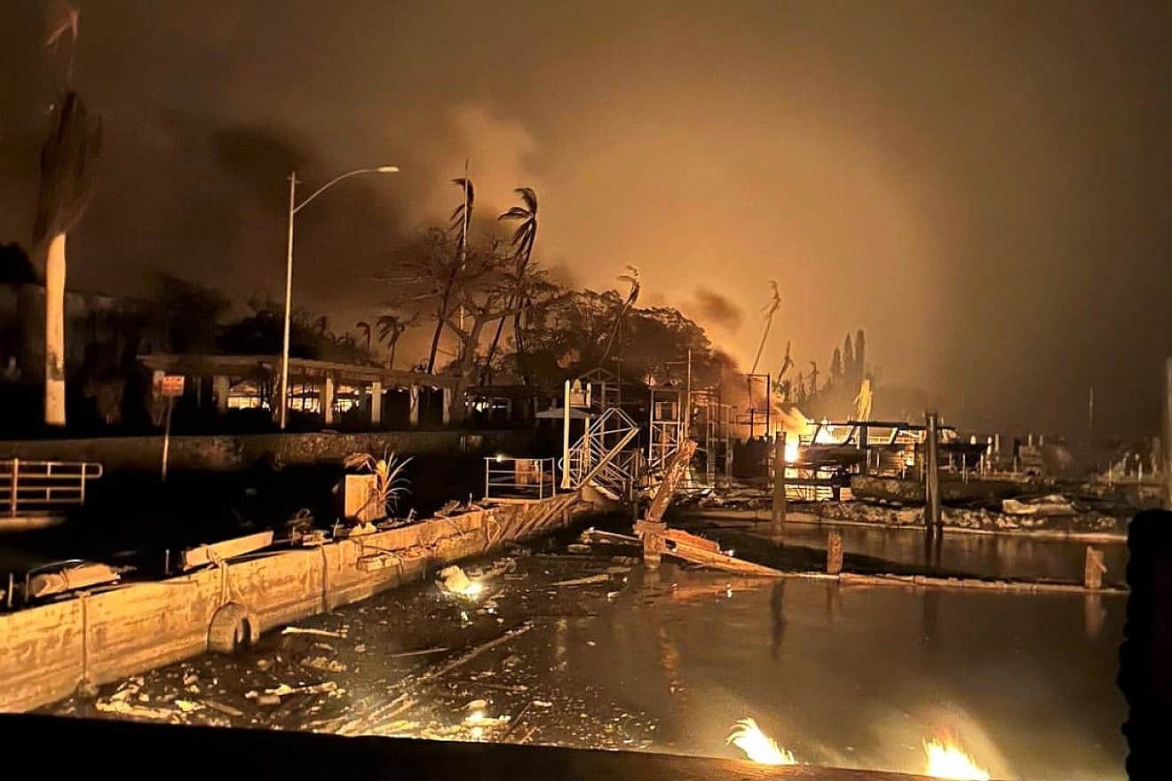 The island of Maui experienced a major wildfire disaster fueled by windy and dry conditions with much the town of Lahaina destroyed, Aug. 8, 2023. Credit: U.S. Coast Guard Hawai'i Pacific District 14 via Wikimedia Commons.