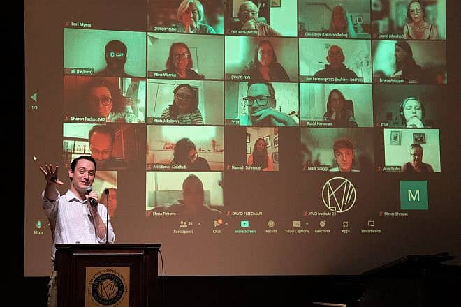 Ben Kaplan, director of education at YIVO, emcees the ceremony for the 82 graduates of the Uriel Weinreich Summer Program in Yiddish Language, Literature and Culture, July 28, 2023. Photo by Melanie Einzig.