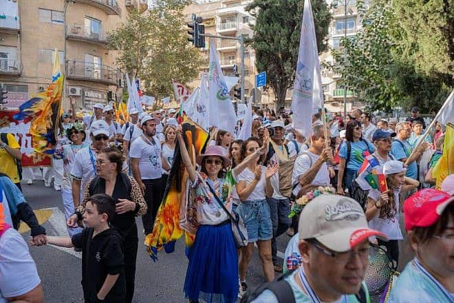 People participate in the Jerusalem March during the intermediate days of Sukkot, October 2022. Photo by Lior Deskal.