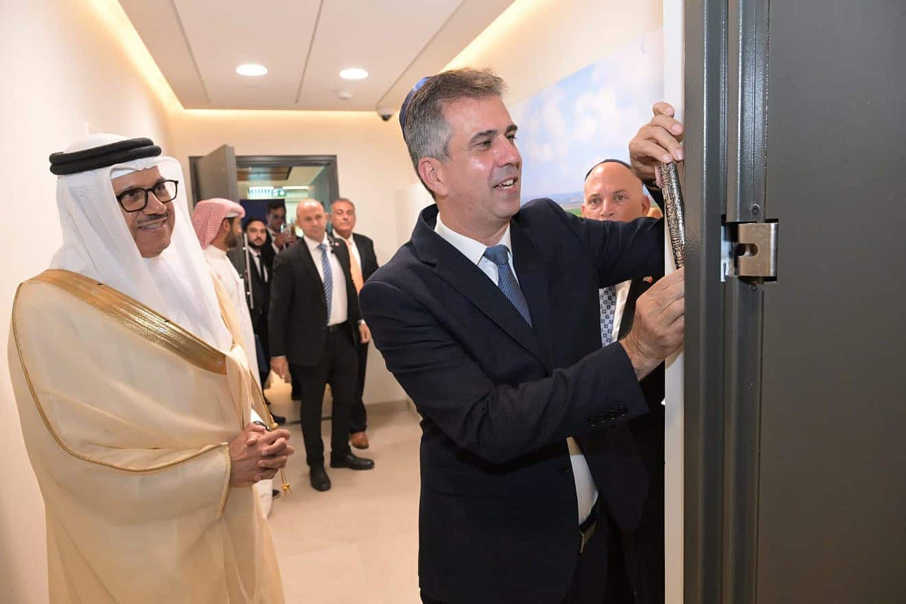 Israeli Foreign Minister Eli Cohen affixes a mezuzah on the doorpost of the Israeli embassy in Manama, Bahrain, Sept. 4, 2023. Photo by Shlomi Amsalem/GPO.