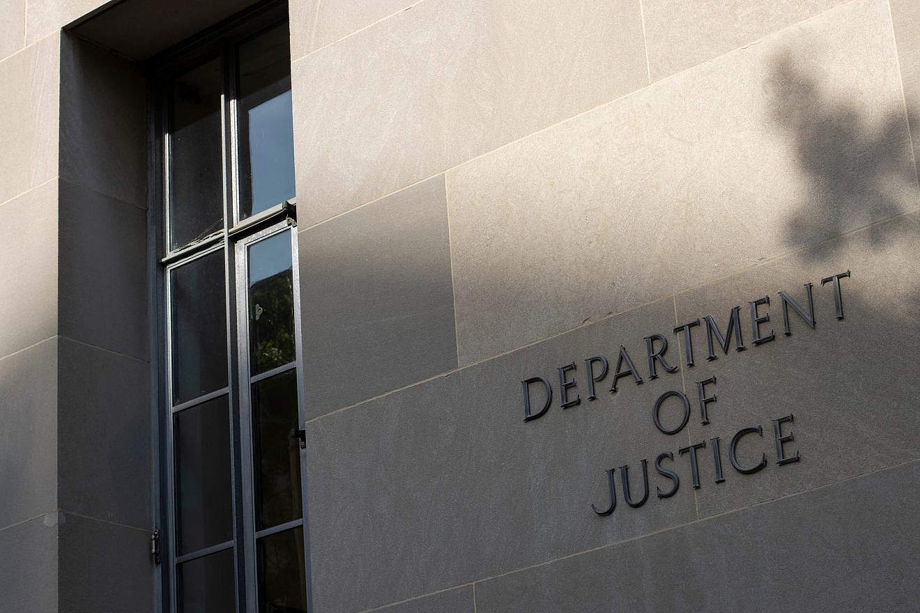 The sign outside the Robert F. Kennedy Building, headquarters of the U.S. Department of Justice in Washington, D.C. Credit: Tada Images/Shutterstock.