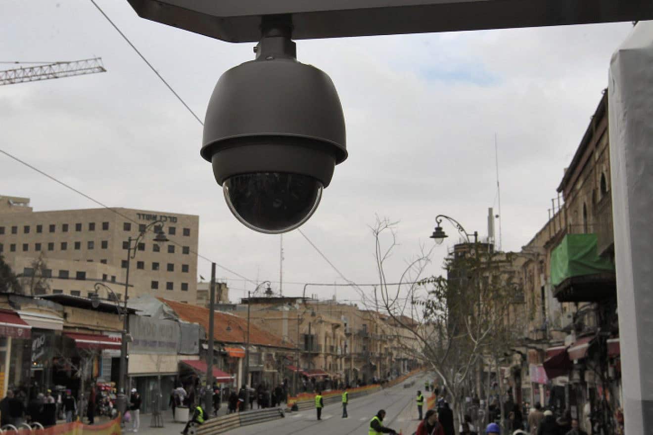 A camera hangs from a light rail stop on Jaffa Road in Jerusalem, Jan. 16, 2011. Photo by Nati Shohat/Flash90.