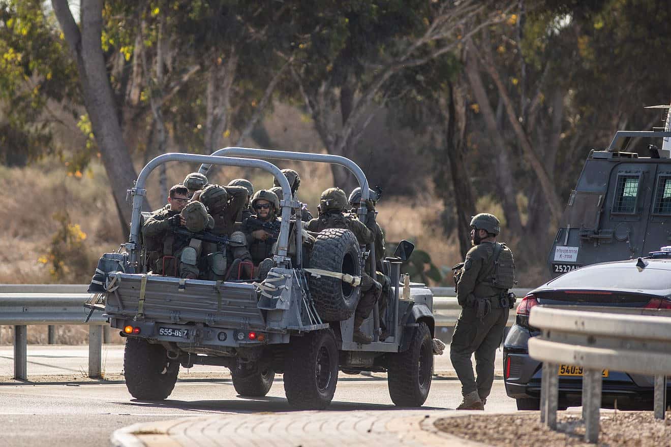 Israeli soldiers patrol a main road near the southern Israeli city of Sderot, Oct. 7, 2023. Photo by Oren Ben Hakoon/Flash90.