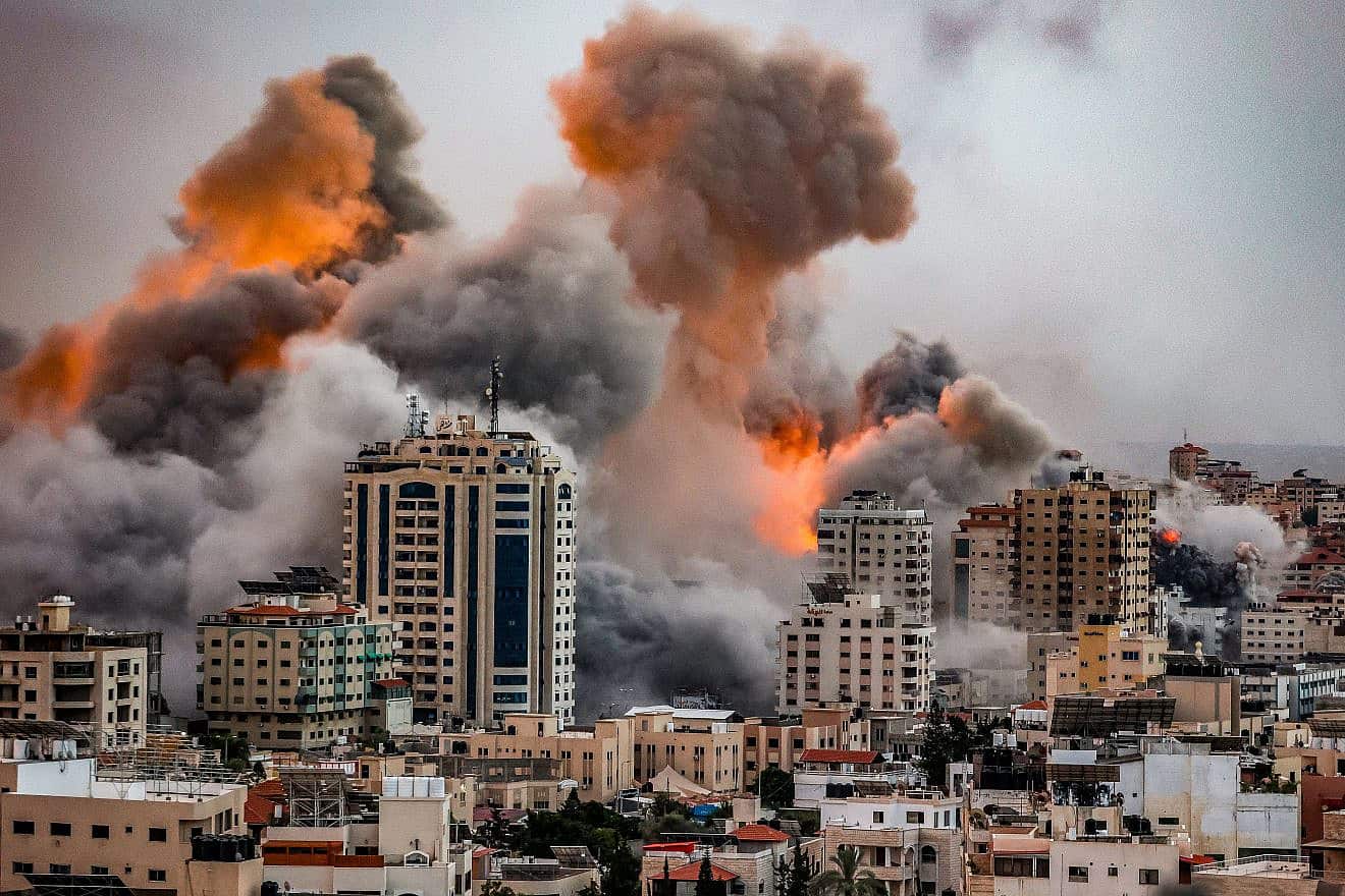Fire and smoke rise during Israeli airstrikes in the Gaza Strip, Oct. 9, 2023. Photo by Atia Mohammed/Flash90.