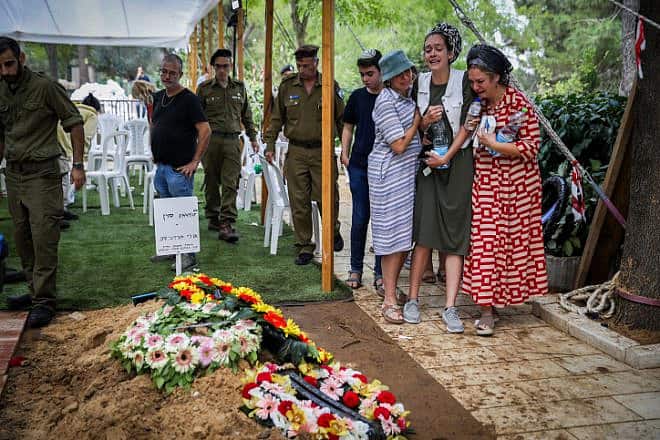 Family and friends attend the funeral of Israeli soldier Uri Mordechai at Mount Herzl cemetery in Jerusalem, Oct. 10, 2023. Photo by Noam Revkin Fenton/Flash90.