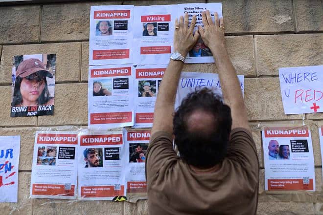 Families of Israelis held hostage by Hamas in the Gaza Strip protest outside the Israeli Defense Ministry in Tel Aviv, Oct. 14, 2023. Photo by Tomer Neuberg/Flash90.