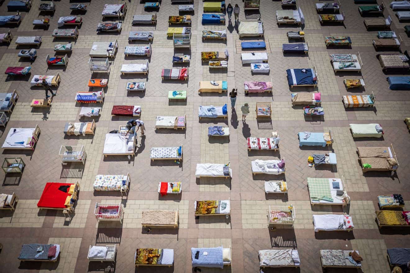 Hundreds of beds outside the Jerusalem Municipality, reflecting the number of Israeli men, women and children abducted on Oct. 7 by the Hamas terrorist organization and being held captive in the Gaza Strip, Oct. 30, 2023. Photo by Yonatan Sindel/Flash90.