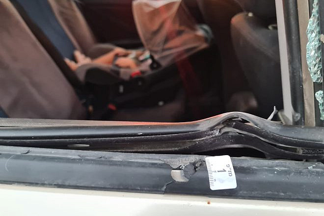 An Israeli car was damaged when a Palestinian terrorist opened fire at the vehicle on Route 60 in Huwara, Oct. 5, 2023. Photo by Nadav Goldstein/TPS.
