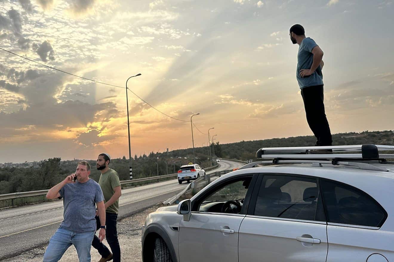 Residents of Karnei Shomron patrol Route 55 in Samaria, on Oct. 10, 2023. Credit: Courtesy of Judith Segaloff.