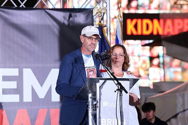 Ronen and Orna Neutra, whose son Omer was a hostage held by Hamas in the Gaza Strip, speak at a "Bring Them Home" rally sponsored by the Israeli-American Council in Times Square, in the heart of New York City, in support of as many as 200 additional hostages, Oct. 19, 2023. Credit: IAC.