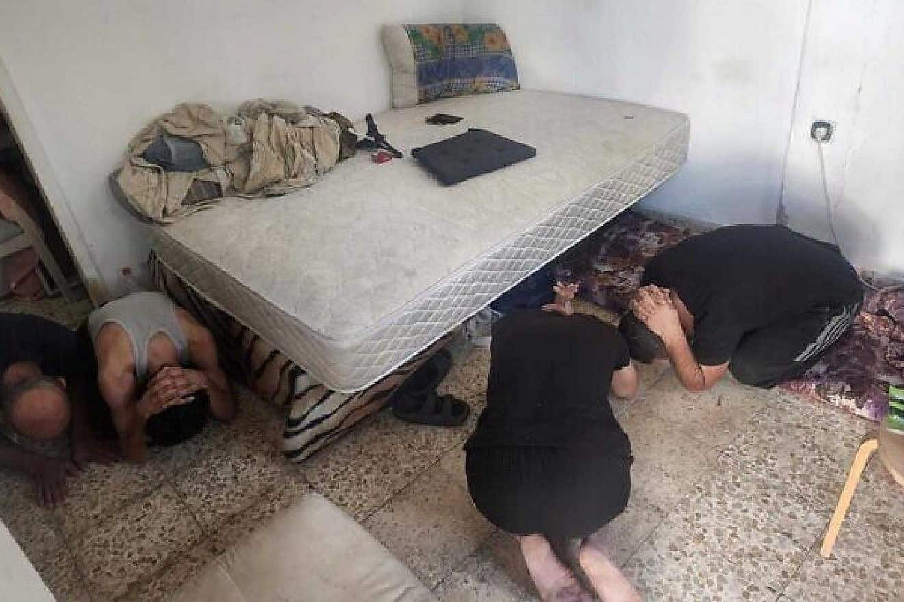 Israeli security forces arrest four Gazans hiding out in an apartment in Beersheva, a city in southern Israel, on Oct. 20, 2023. Credit: Israel Police.