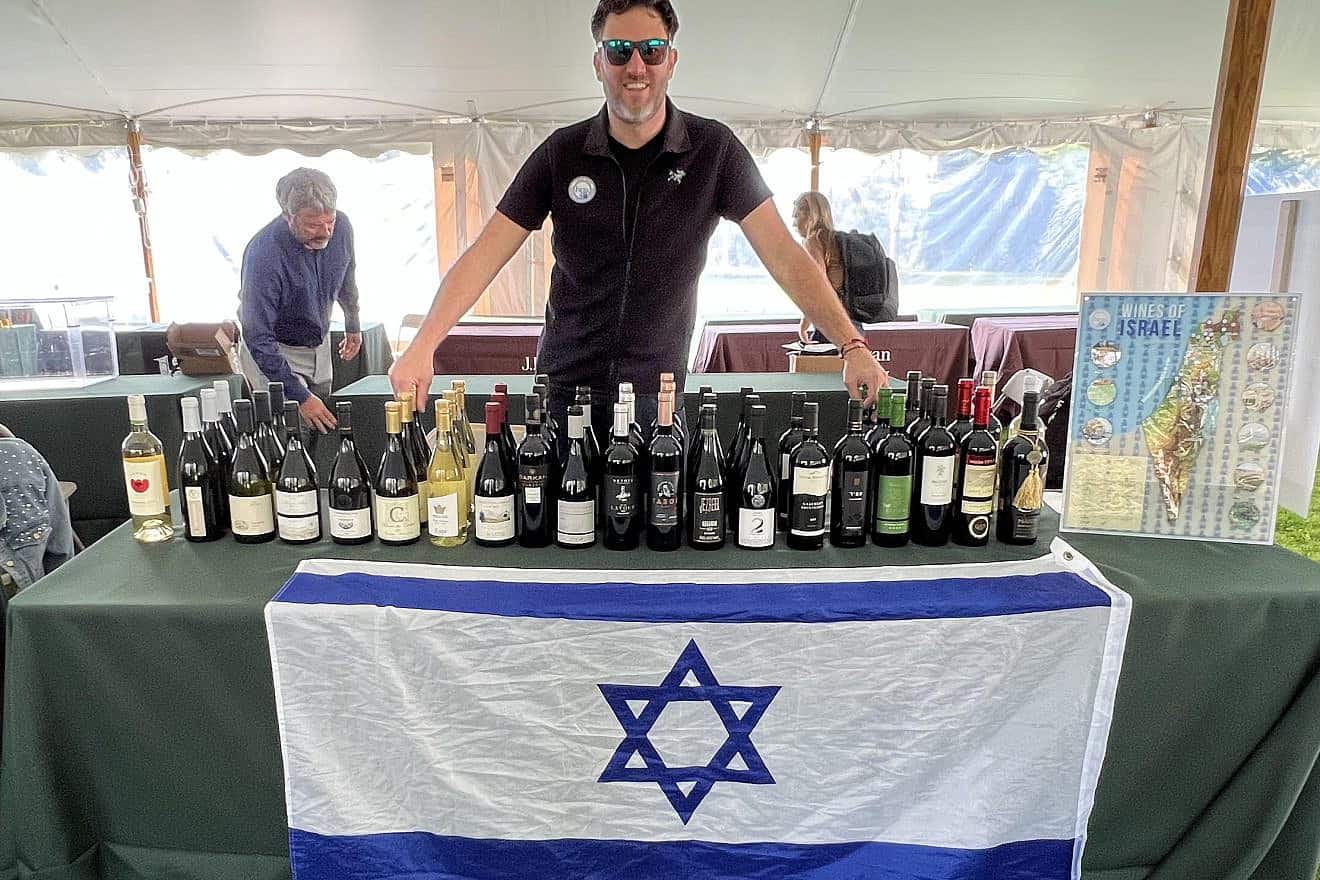 Joshua Greenstein, vice president of the IWPA, with Israeli wines. Credit: Courtesy.