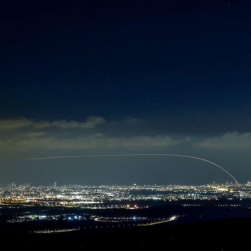 The Iron Dome air-defense system fires interceptor missiles at rockets fired from the Gaza Strip at Israel, as seen from Moshav Neve Ilan, west of Jerusalem, on Oct. 18, 2023. Photo by Chaim Goldberg/Flash90.