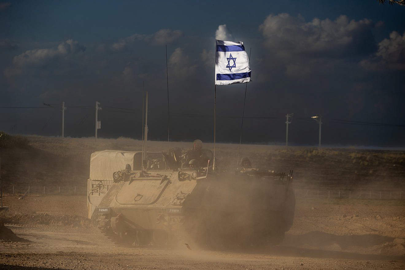 A convoy of military vehicles seen near the Israeli border with the Gaza Strip on Oct. 15, 2023. Photo by Oren Ben Hakoon/Flash90.