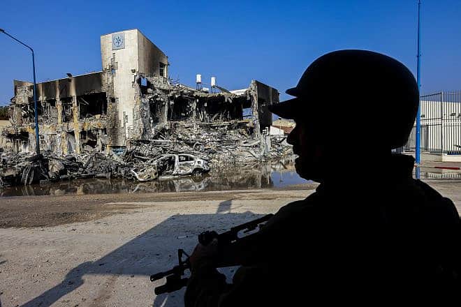 An Israeli police officer stands guard outside of a police station in the southern Israeli city of Sderot, Oct. 8, 2023. Photo by Yossi Zamir/Flash90.
    