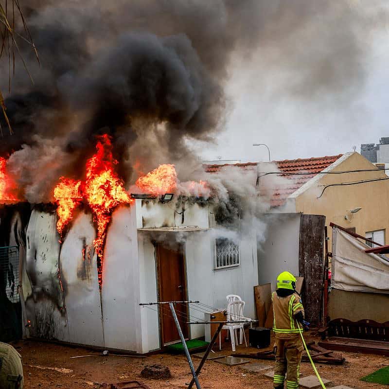 Israeli security forces at the scene where a rocket fired from the Gaza Strip hit a shelter in the southern Israeli city of Sderot, Oct. 9, 2023. Photo by Yossi Zamir/Flash90.