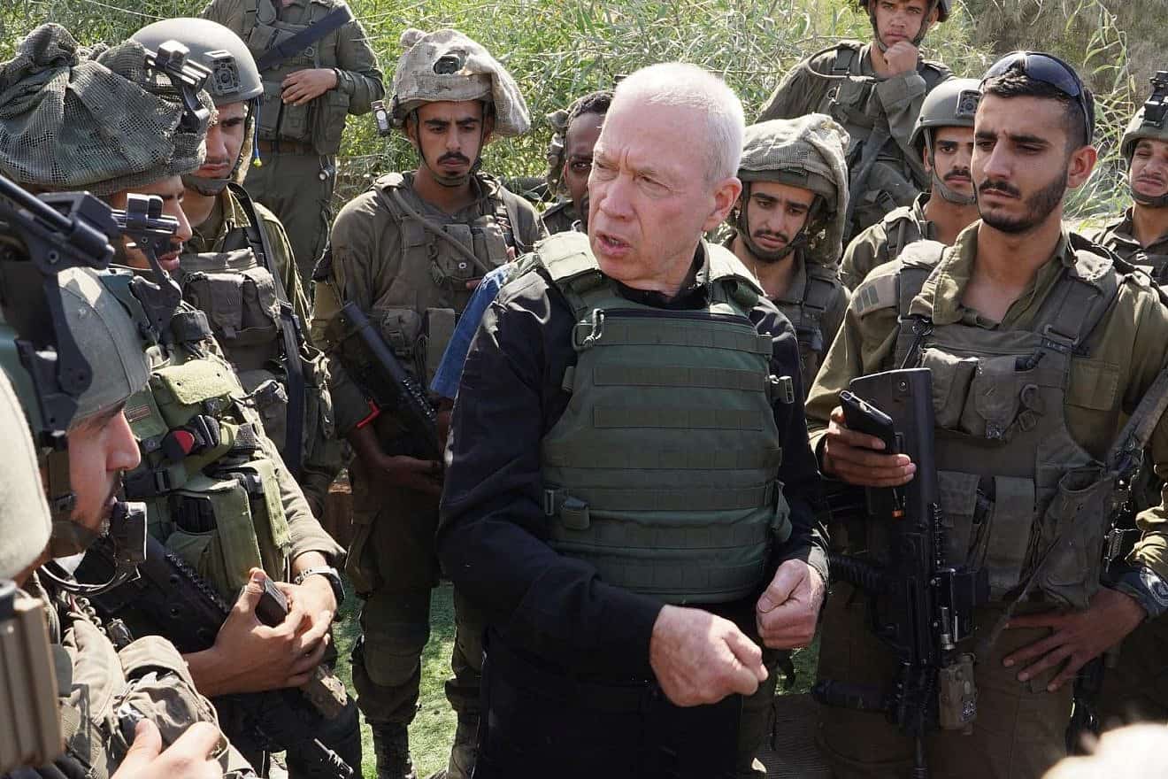 Defense Minister Yoav Gallant speaks with troops near the Gaza border, Oct. 15, 2023. Photo by Ariel Hermoni/Israel Ministry of Defense.
