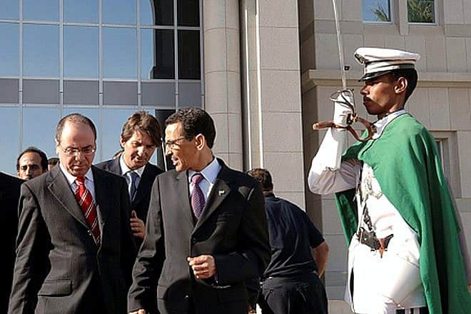 Then-Israeli Foreign Minister Silvan Shalom (left) is greeted by his Mauritanian counterpart Mohamed Vall Ould Bellal in Noukchott on March 5, 2005. Photo by Amos Ben-Gershom/GPO.