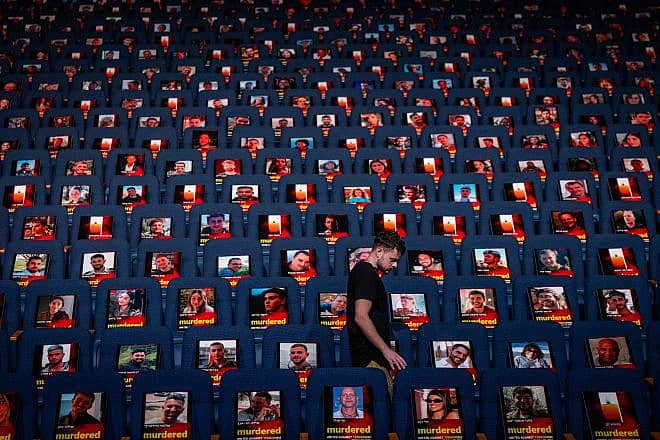 Photos of more than 1,000 people abducted, missing and/or killed in the Hamas terrorist attacks on Oct. 7 in southern Israel are being displayed in the Smolarz Auditorium at Tel Aviv University, Oct. 22, 2023. Photo by Yonatan Sindel/Flash90.