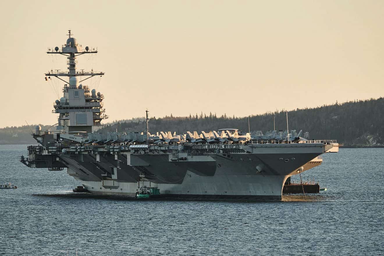 “USS Gerald R. Ford.” the lead ship of her class of U.S. Navy aircraft carriers, in Halifax, Nova Scotia, Canada, on Oct. 28, 2022. Credit: Wandering views/Shutterstock.