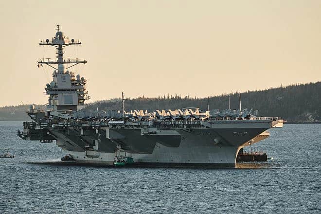 “USS Gerald R. Ford.” the lead ship of her class of U.S. Navy aircraft carriers, in Halifax, Nova Scotia, Canada, on Oct. 28, 2022. Credit: Wandering views/Shutterstock.