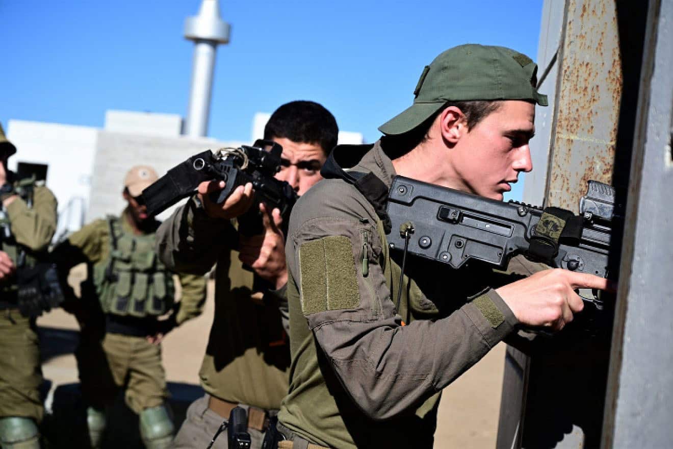Infantrymen frrom the Golani Brigade's 51st Battalion train in underground tunnel urban warfare at a mock Arab village on the Golan Heights before heading to Gaza, May 15, 2021. Photo by Michael Giladi/Flash90.