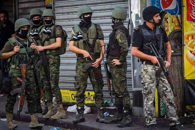 Palestinian Authority security personnel during clashes with Palestinian protesters in Nablus, Samaria, Sept. 20, 2022. Photo by Nasser Ishtayeh/Flash90.