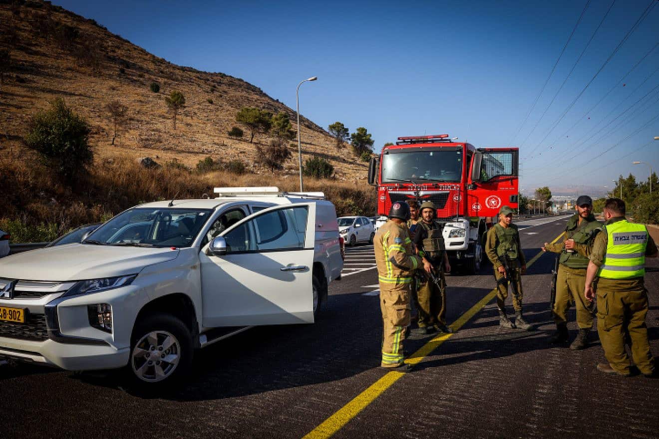 Israeli forces at the scene of an anti-tank guide missile attack from Lebanon on a vehicle near Kibbutz Yiftah, Nov. 5, 2023. Photo by David Cohen/Flash90.