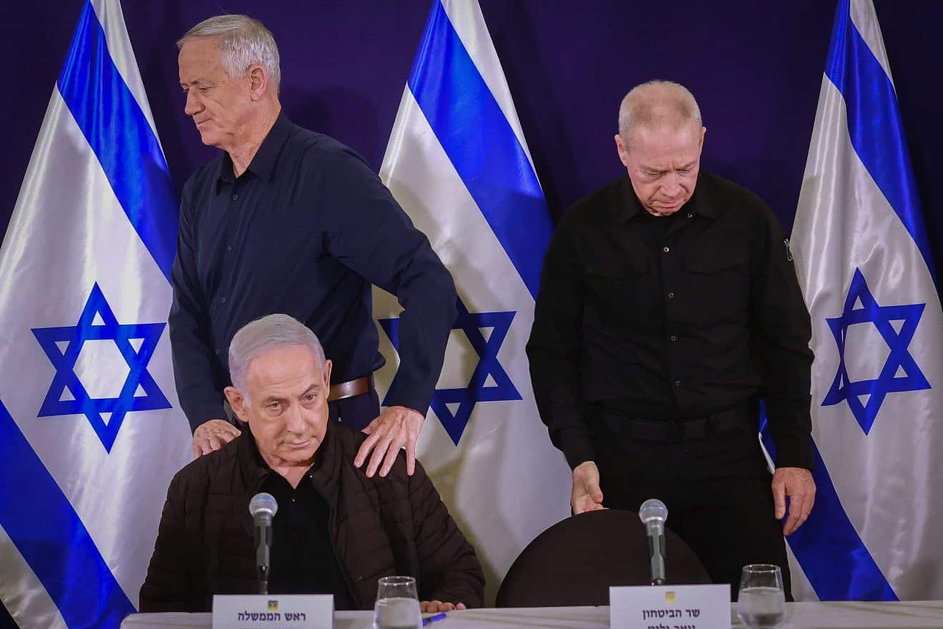 Prime Minister Benjamin Netanyahu, Defense Minister Yoav Gallant (left) and War Cabinet Minister Benny Gantz hold a press conference at the Defense Ministry in Tel Aviv, Nov. 11, 2023. Photo by Marc Israel Sellem/POOL.