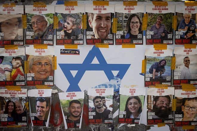 Pictures of civilians held hostage by Hamas terrorists in Gaza, in Jerusalem, Nov. 14, 2023. Photo by Chaim Goldberg/Flash90.
