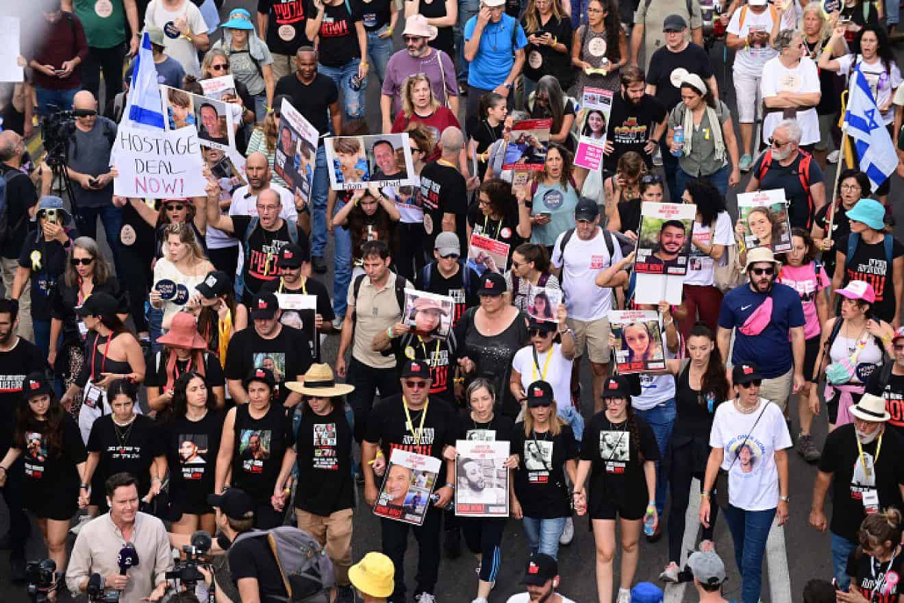 Israelis march in Tel Aviv towards the Israeli parliament in Jerusalem, as part of a protest for the release of Israelis held kidnapped by Hamas terrorists in Gaza on Nov. 14, 2023. Photo by Tomer Neuberg/Flash90.
