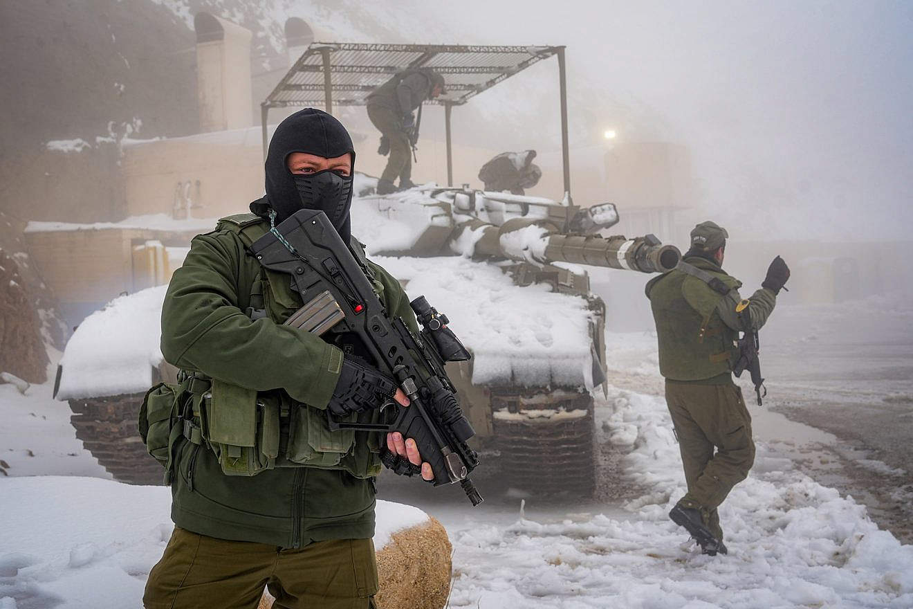 Israeli soldiers patrol on Mount Hermon, near the borders with Syria and Lebanon, Nov. 20, 2023. Photo by Ayal Margolin/Flash90.