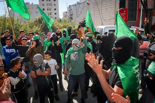 Palestinians take part in a protest in support of Hamas, in Hebron, Nov. 24, 2023. Photo by Wisam Haslmaoun/Flash90.