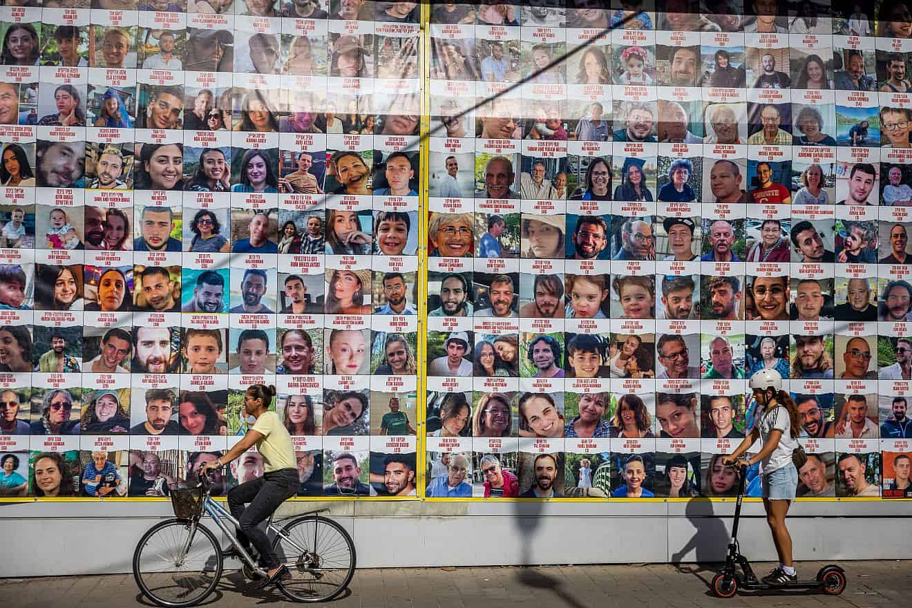 Pictures of civilians held hostage by Hamas terrorists in the Gaza Strip are seen in Jerusalem, Nov. 24, 2023. Photo by Yonatan Sindel/Flash90.