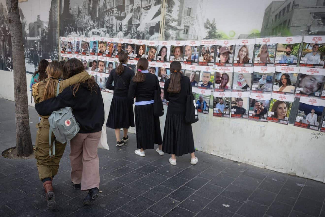 Pictures of civilians held hostage by Hamas terrorists in Gaza, in Jerusalem, Nov. 22, 2023. Photo by Chaim Goldbergl/Flash90.