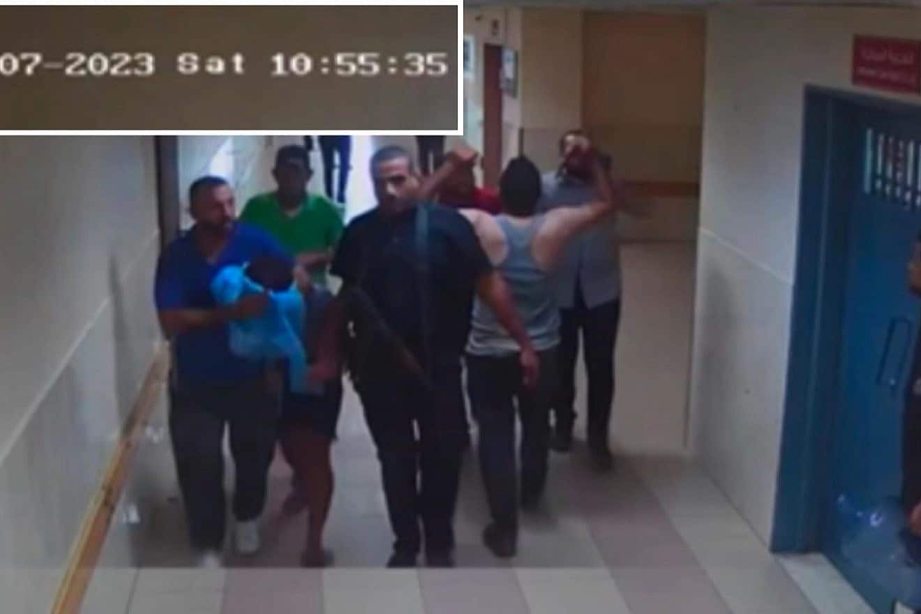 Hostages being moved inside Shifa Hospital in Gaza City. Source: IDF Spokesperson's Unit.